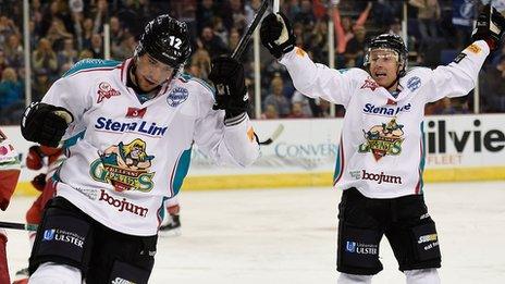 Ray Sawada (left) celebrates scoring for Belfast Giants against Cardiff Devils