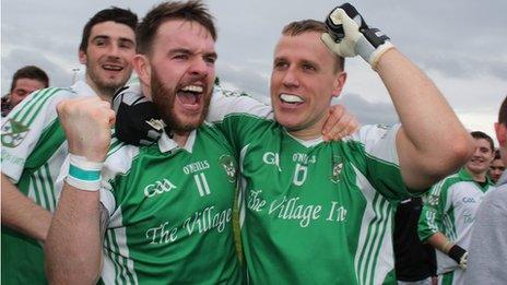 Shane Mcmahon and Peter Lynch celebrate Roslea's victory over Teemore