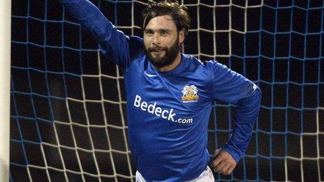 Gary Hamilton celebrates his goal against Warrenpoint