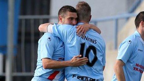 Ballymena celebrate their opening goal