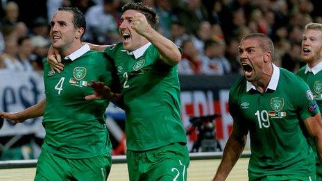 John O'Shea celebrates his last-gasp equaliser against Germany