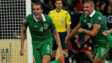 Republic of Ireland defender John O'Shea celebrates his last gasp equaliser against Germany