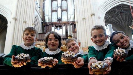 Choir boys with cakes at Bath Abbey