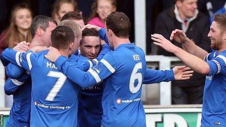 Jason McCartney is congratulated after scoring the opener against Dungannon