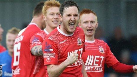 Gary Twigg celebrates after scoring Portadown's second goal against Ballinamallard