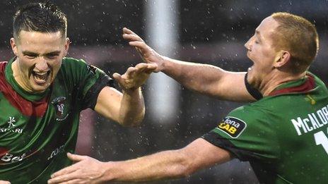 Jim O'Hanlon celebrates with Glentoran team-mate Stephen McAlorum after scoring the first goal against Ballymena United