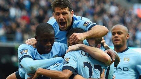 Manchester City celebrate Sergio Aguero's opening goal