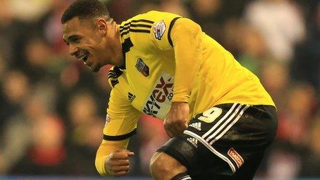 Brentford's Andre Gray celebrates scoring at Nottingham Forest