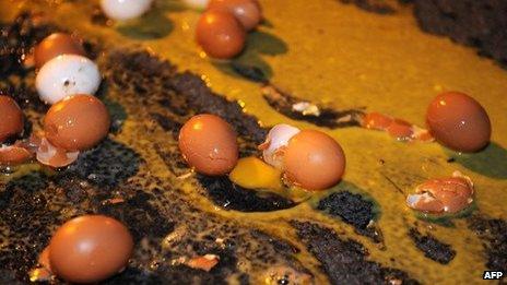 Eggs litter the road after a protest in France