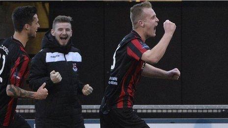 Jordan Owens celebrates scoring against Cliftonville