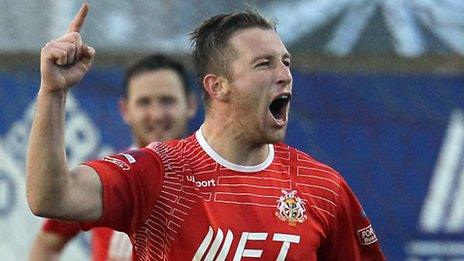 Mark McAllister celebrates after scoring Portadown's third goal against Glenavon