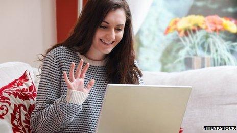 Woman using webcam