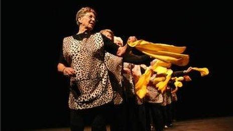 Members of Powys Dance’s Senior Moment(um) group perform their piece “Dusters”