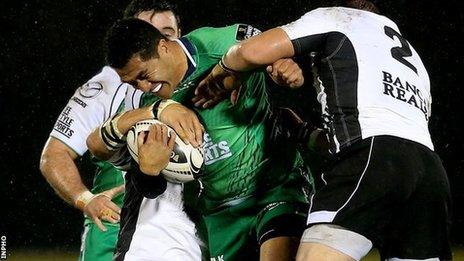 Connacht's Mils Muliaina is tackled by Zebre pair Andries van Schalkwyk and Oliviero Fabiani