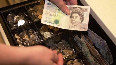 Cashier handling money