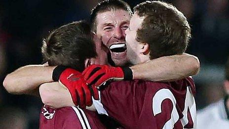 Slaughtneil players celebrate their narrow victory in the Ulster Club final