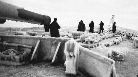 British warship covered in ice during an Arctic Convoy