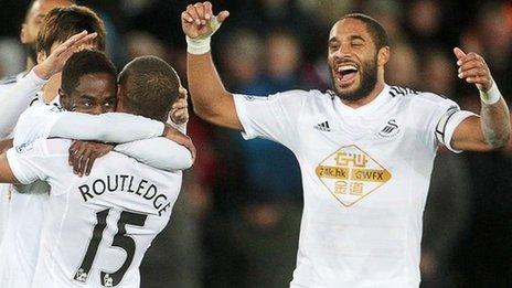 Swansea celebrate Wayne Routledge's goal
