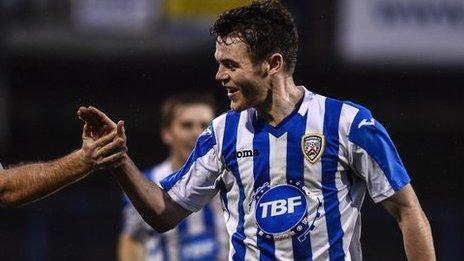 Shane McGinty celebrates after opening the scoring