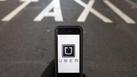 Uber logo on smartphone