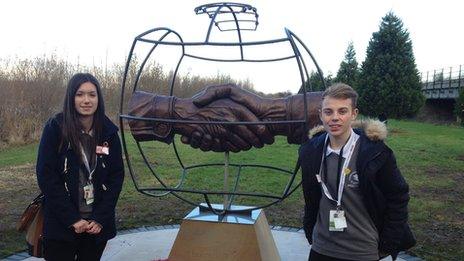 Katie and Ben in front of the memorial