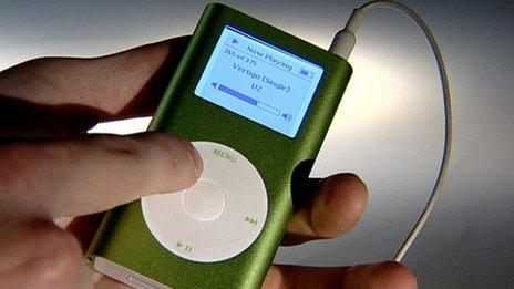 man holding iPod