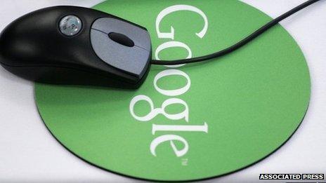 A mouse and Google mousepad