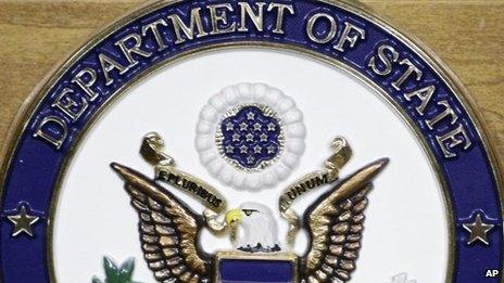 US State Department crest on podium