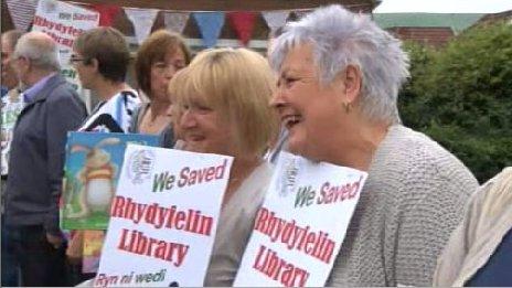 Happy campaigners after the library was saved in June