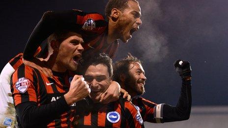 Brighton celebrate An Adrian Colunga goal at Fulham