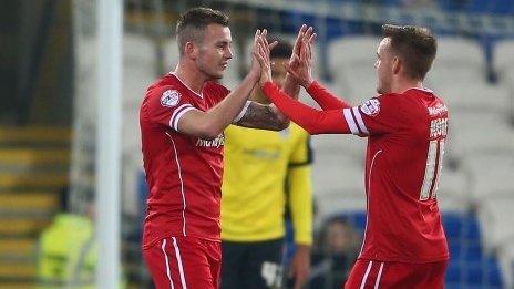 Cardiff players celebrate