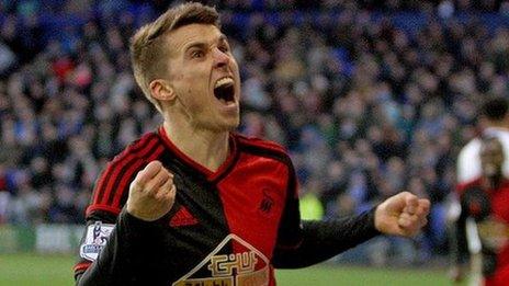 Tom Carroll celebrates his goal