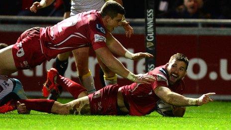 Scarlets back-row John Barclay scores a try with Scott Wiliams in support
