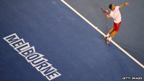 Stanislas Wawrinka of Switzerland serves in the 2014 men's final