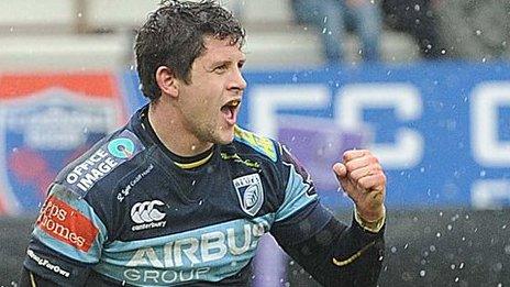 Lloyd Williams celebrates is try