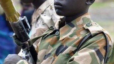 A young member of the South Sudan Democratic Movement/Army (SSDM/A) faction stands in Gumuruk on May 13, 2014