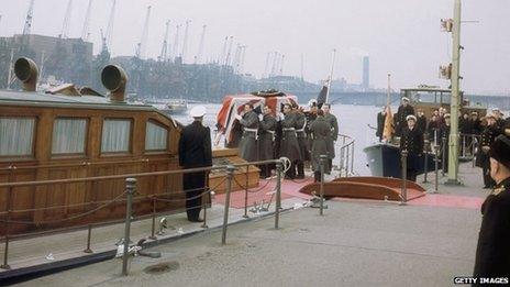 Churchill's coffin on board the Havengore at Tower Pier after the state funeral at St Paul's cathedral