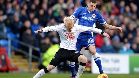 Lee Hughes of Derby County and Stuart O'Keefe of Cardiff City