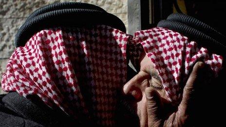 Safi al-Kasasbeh (right) father of slain Jordanian pilot Moaz al-Kasasbeh receives condolences from tribal leaders at their home village of Ai, near Karak, Jordan (04 February 2015)