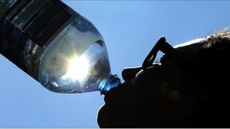 Man drinking bottled water