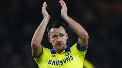 John Terry applauds