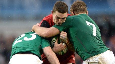 George North is tackled by Fergus McFadden and Chris Henry of Ireland in the 2014 Six Nations