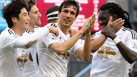 Swansea players celebrate