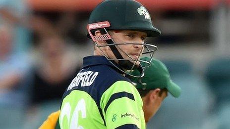 Ireland captain William Porterfield walks off after being dismissed by Kyle Abbott early in his team's reply