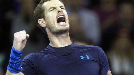 Andy Murray celebrates victory over John Isner