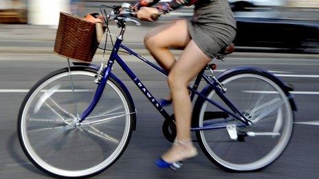 Woman riding bike