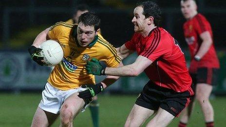 Padraic Harnan is challenged by Down's Conall McGovern at Pairc Esler