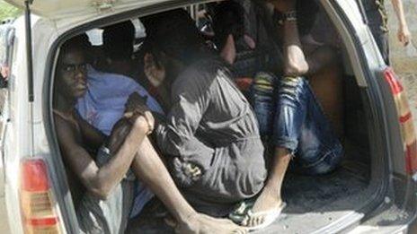 Students of the Garissa University College take shelter