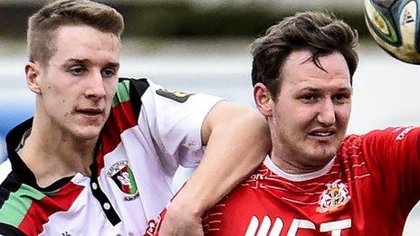 Glentoran's Calum Birney and Gary Twigg of Portadown