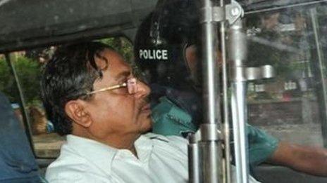 Muhammad Kamaruzzaman deputy head of the Jamaat-e-Isami Political Party being driven either to or from Dhaka Court in May 2013